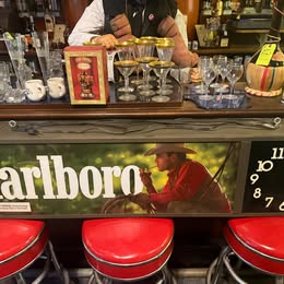 Vintage Marlboro lighted advertising sign with a built-in clock