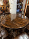 Round, dark wood dining table