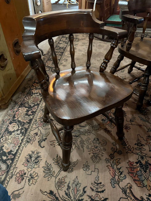 Round, dark wood dining table