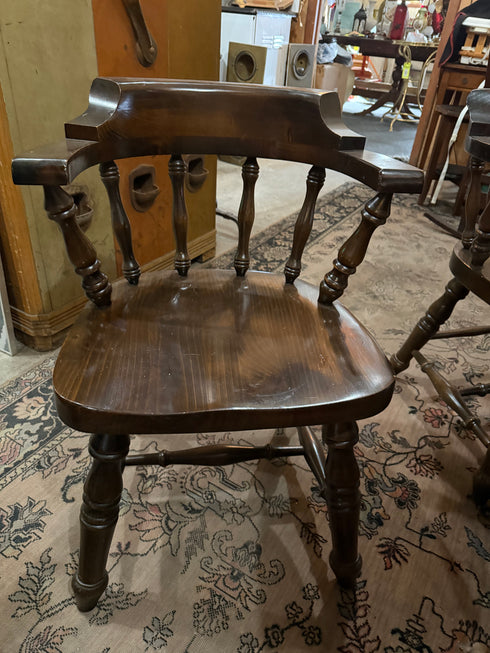 Round, dark wood dining table