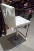 All white leather and chrome pub height spinning chairs. (6 of them)