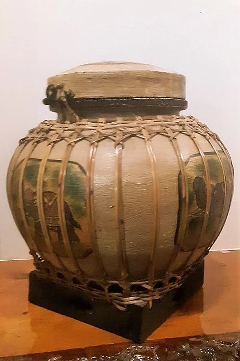 Antique Hand carved bulb type jug.